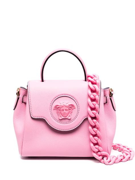 versace miss pink parfum|pink versace perfume with backpack.